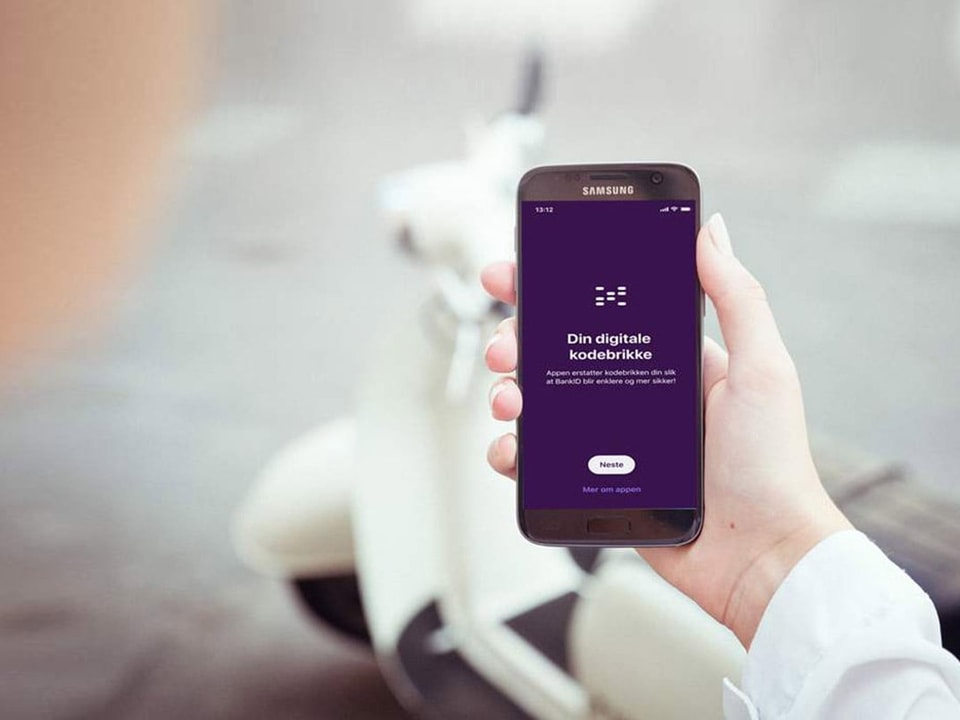 Mobil med bankID-app på skjermen - illustrasjon for BankID-app